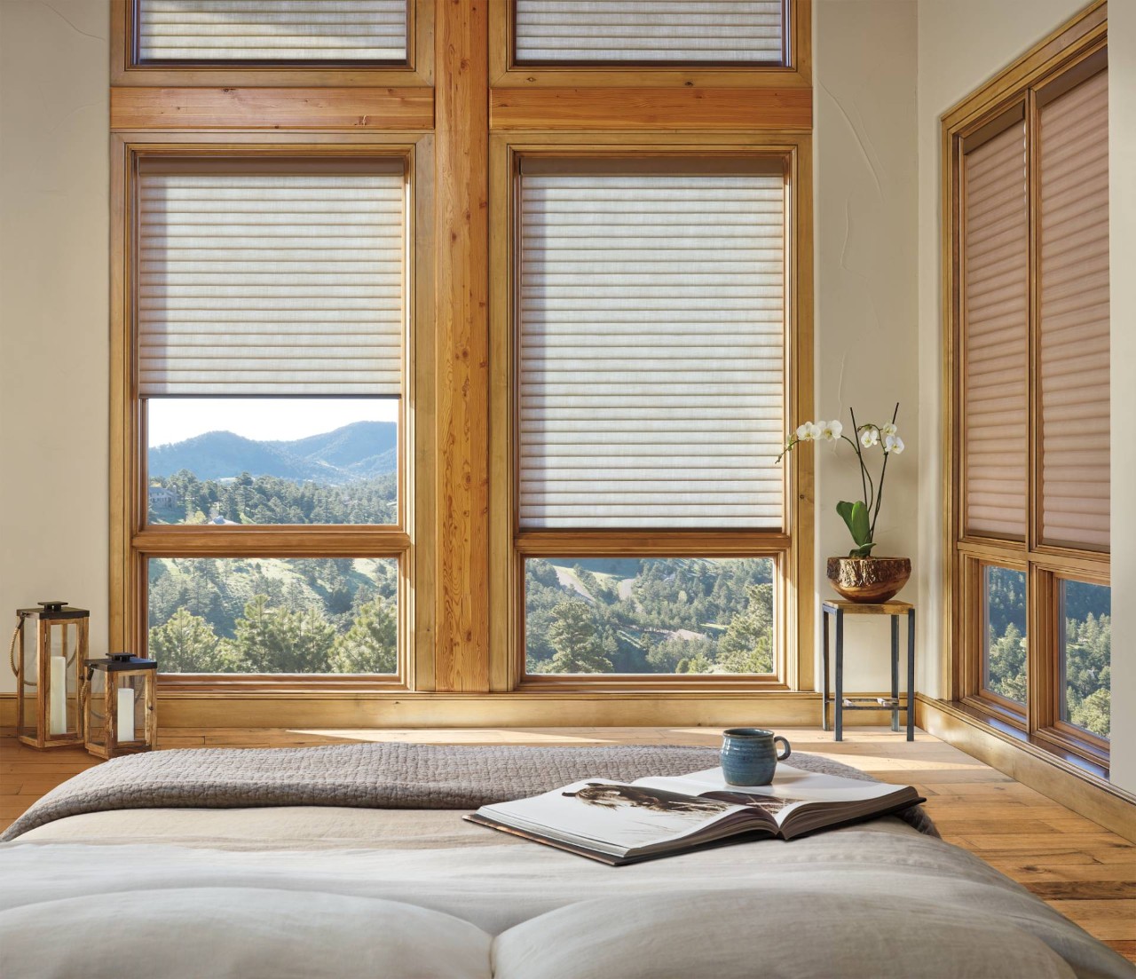 Hunter Douglas Sonette® Roller Shades decorating a wood-floored bedroom near Silver Spring, MD